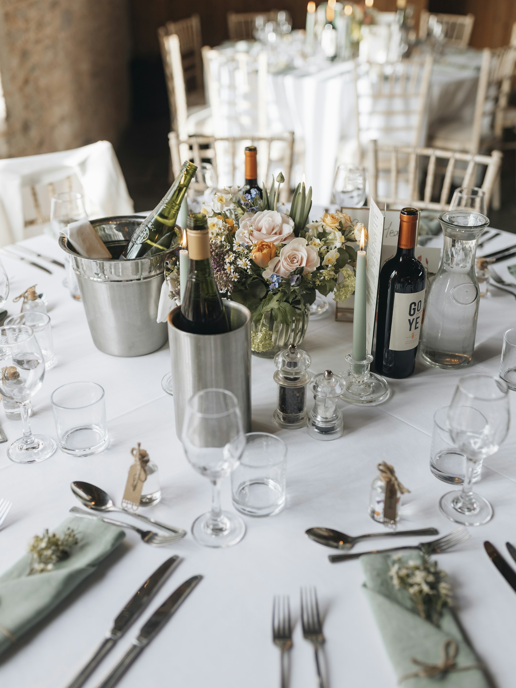 A place setting prepared for a wedding reception