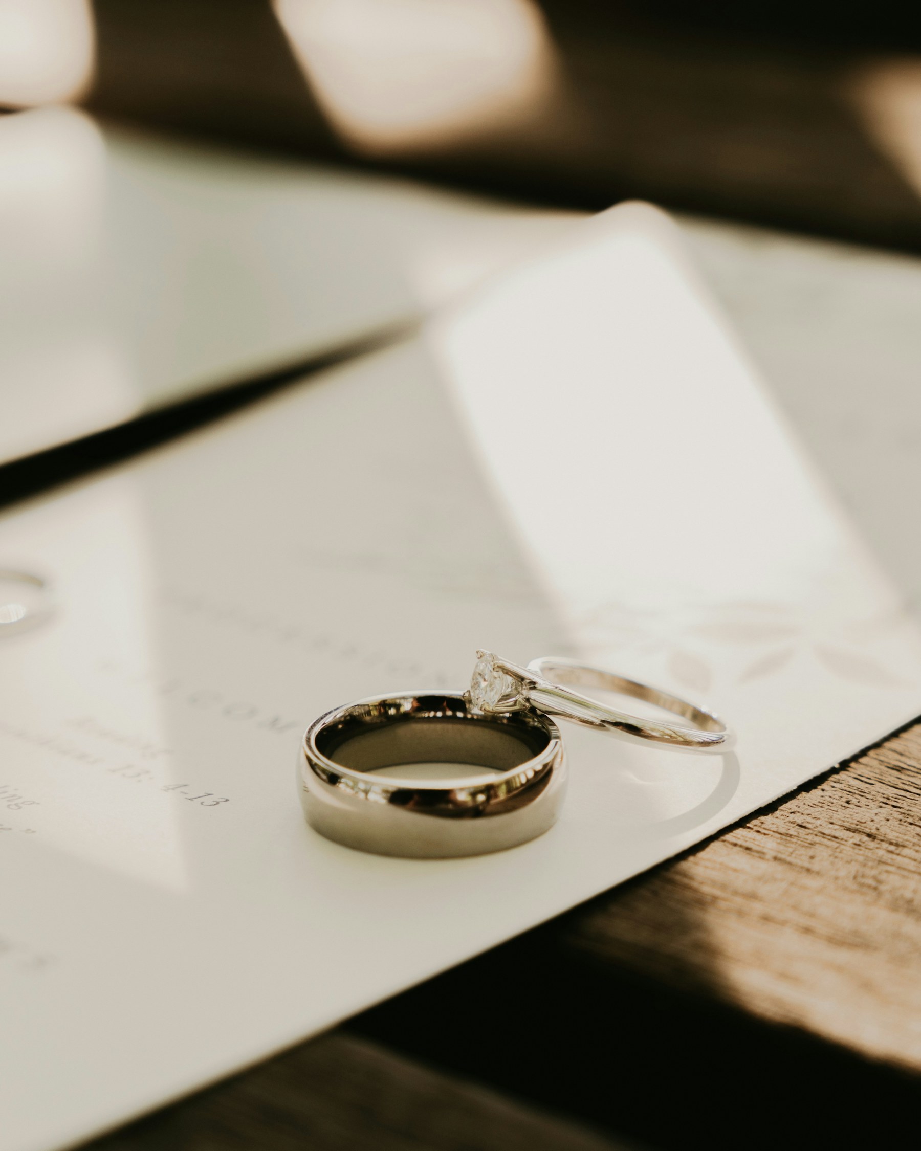 Wedding rings resting on paper