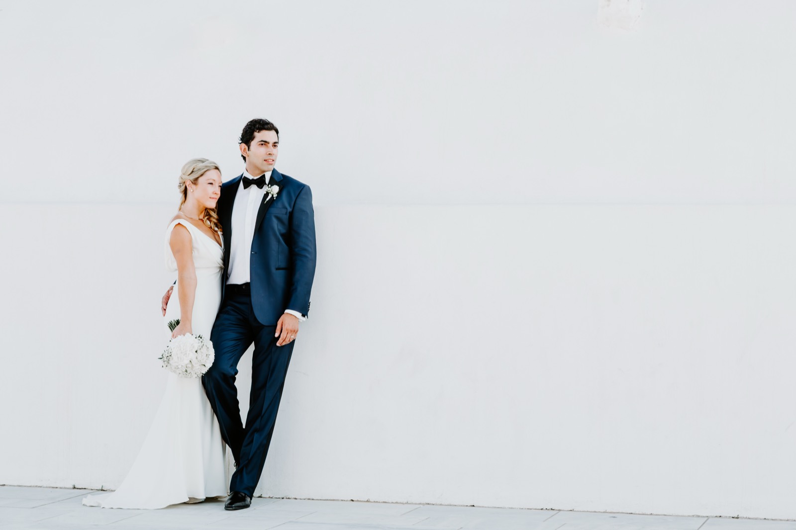 Wedding couple portrait with warm editorial style