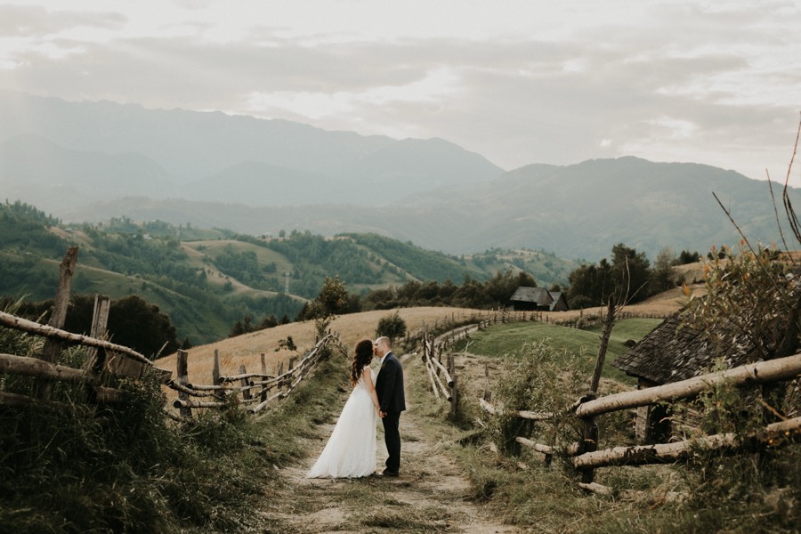 Bride and groom at wedding reception exit