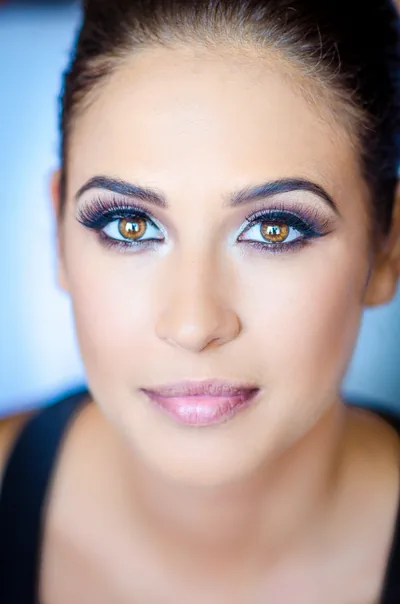 A close bridal portrait with blue eye makeup